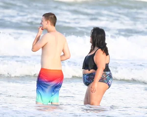 Extra thick girl at the beach in a bikini