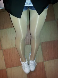 Young Girl in Shorts and Pantyhose