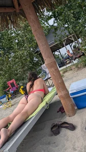 Bikini flower Bend over on the beach. OC