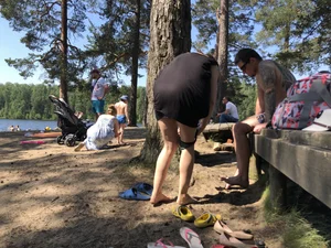 Candid Girl Putting On Swimsuit and Undressing at the Forest Lake Beach Gallery