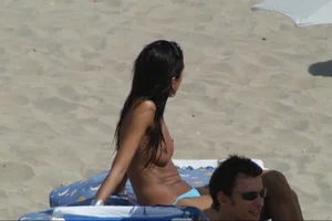 Girls on a nude beach in Sitges, Spain