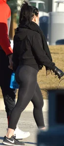 Brunette walking in leggings with a thick booty and showing some camel toe