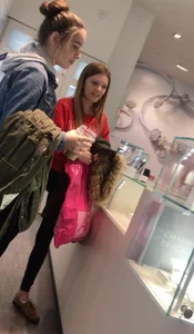 Skinny Girls in Tights at the Cash Register Store Candid Photos