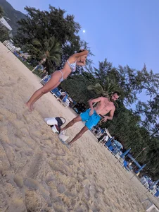 Large collection of hot beach girls lying on the beach and bending over