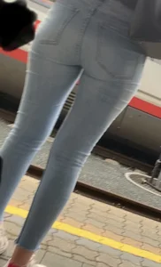 Tight jeans ass at train station