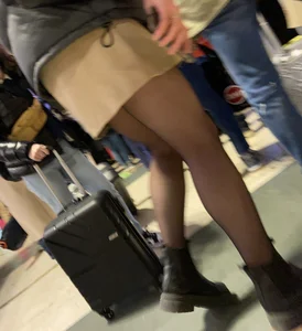 Candid closeup of legs in black pantyhose
