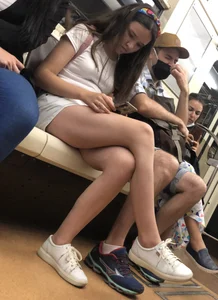 Cute Teen Girl in Shorts in Subway Train Candid Photos