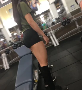 Girl with Muscular Legs in a Gym Hot Candid Photos