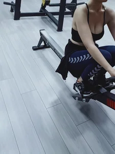 Hot girl working out at the gym