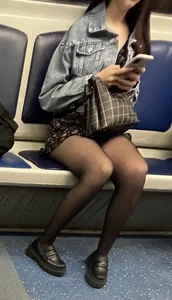 Amazing sevy legs in black pantyhose in a subway train, hot candid girl in a skirt public transport creepshot