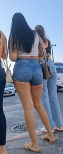 super sexy denim short shorts on this brunette with tremendous legs and big butt
