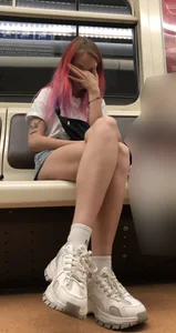 Girl With Pink Hair and Hot Legs in Denim Shorts in the Subway Train Candid Photo Gallery
