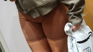 Close up Cameltoe in Brown Shorts with Amazon Package in Hand