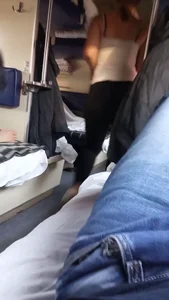 Candid girls with smoking asses in leggings passing by in a train sleeping car