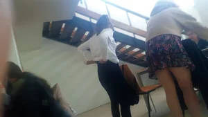 Young girl pulling up her pants