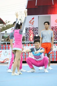 Bunch of athletic Thai cheerleaders at a competition