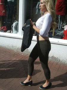 Sexy blonde out walking in green leggings with vpl