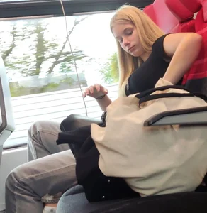 Hot busty blonde on train