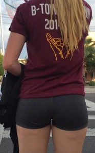 Candid blonde teen's butt in spandex shorts