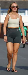 Blonde woman in lycra shorts - good front view, back view ruined by a bag