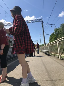 Cute candid teen on a train platform