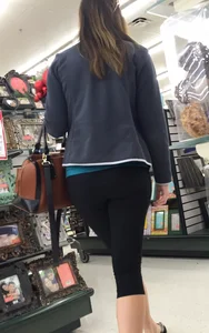 Sexy lady shopping at Walmart in leggings