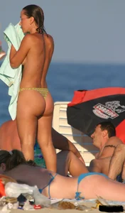 A bunch of sexy beach voyeur babes in bikinis, thongs and topless