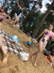 Girls in One-Piece Body Swimsuits Running Towards Water and Swimming - Beach Photo Gallery