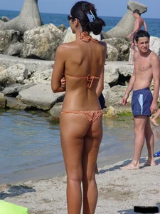Beach voyeur girls in bikinis, thongs and topless