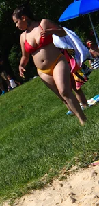 Thick girl with tattoos, big tits and a big booty in a little bikini