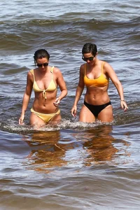 Frankie Bridge nip slips in a bikini on the beach