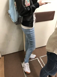 Skinny Legs in Tight Jeans and Leather Jacket Subway Train Candid