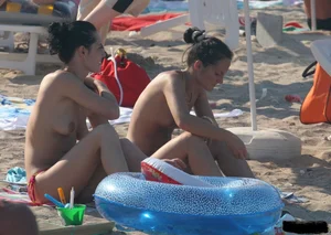 A bunch of sexy beach voyeur babes in bikinis, thongs and topless