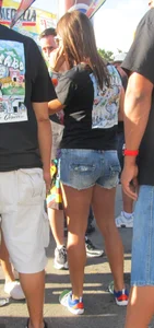 Brunette babe standing around in denim shorts