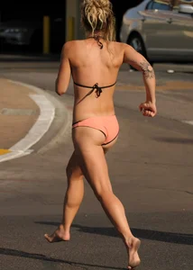 Sexy blonde with a nice ass in a peach bikini
