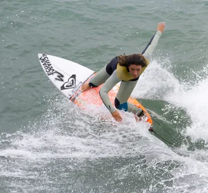 Candid surfer babes on the beach and in bikinis