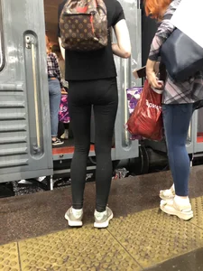 Teen Girl in Tights And Sneakers Standing on the Train Platform VPL Photos
