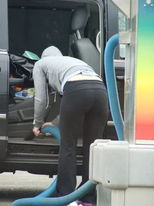 Girls cleaning their cars in jeans and pants