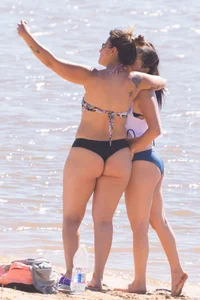 Candid beach girls in thongs