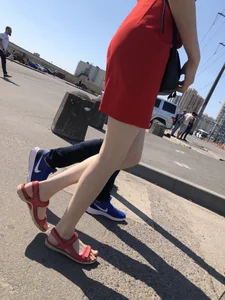 Girl in a Red Dress and Sandals With Thin, Pale Legs on the Crosswalk City Creepshots Gallery