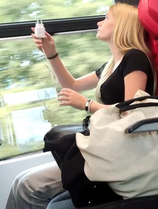Hot busty blonde on train