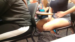 Girl in Denim Shorts in the College Classroom Creepshot