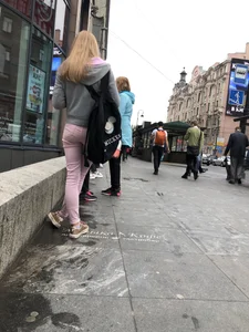 Cute skinny blonde candid teen wearing tight pink jeans