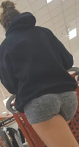 Got in line right behind these sexy ass cheeks and tan legs in short SKIN-TIGHT shorts. W