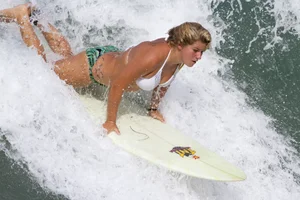 Candid surfer babes on the beach and in bikinis