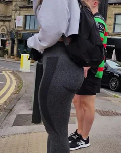 Brunette girl in grey leggings