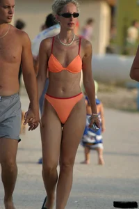 Beach voyeur girls in bikinis, thongs and topless