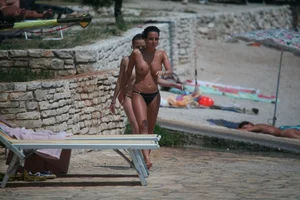 3 amazing topless girls on a nudist beach