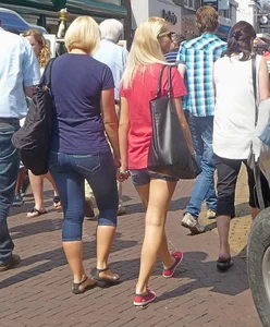 Blonde in shorts with nice legs street creepshot