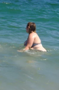 Busty bbw girl couldn’t contain huge boobs in bikini pt 2